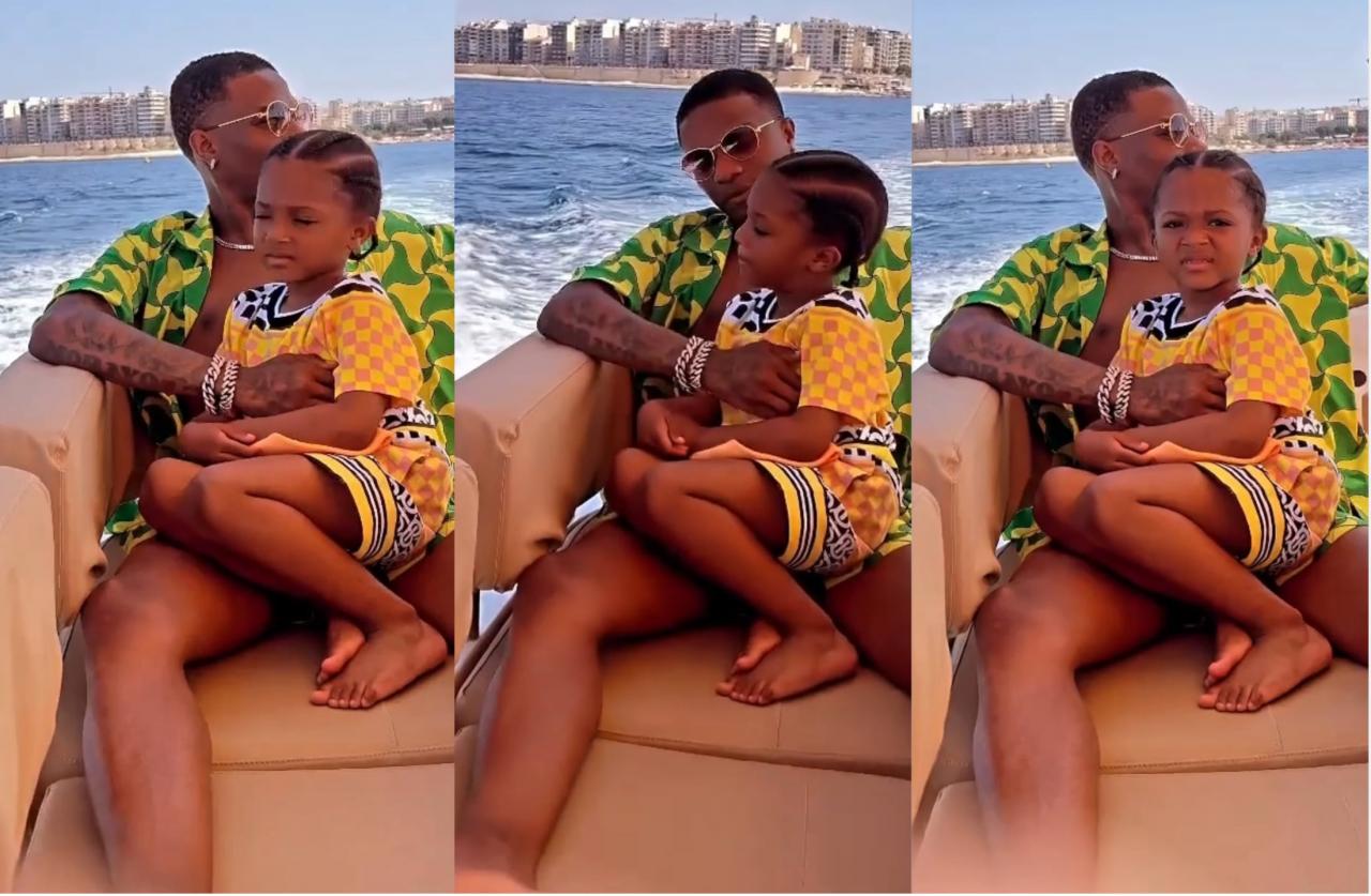Wizkid dragged as he vacations in style with third son, Zion